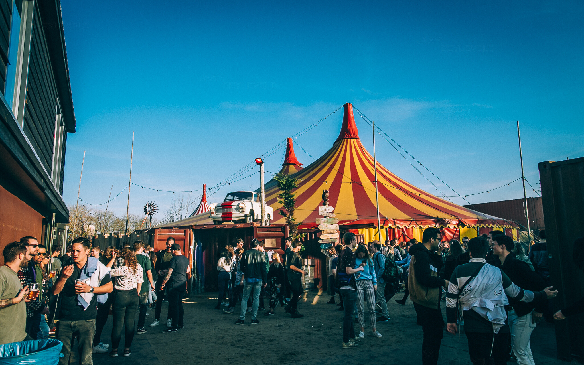 Circus tent and crowd in daylight